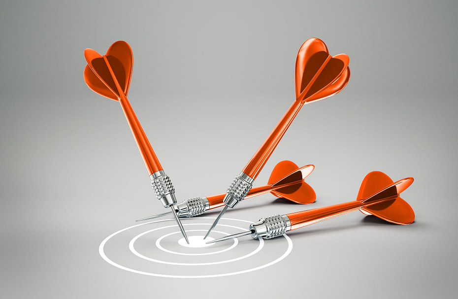 conceptual darts isolated on a grey background
