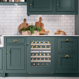 Caple wine cooling integrated into green cabinets