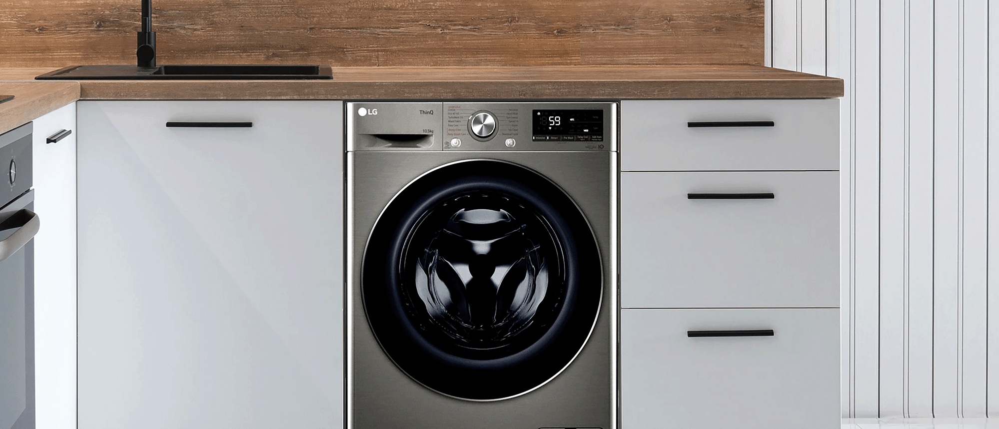 LG dark grey washing machine in a kitchen