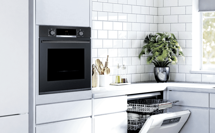 A black Bosch built-in oven ina white kitchen