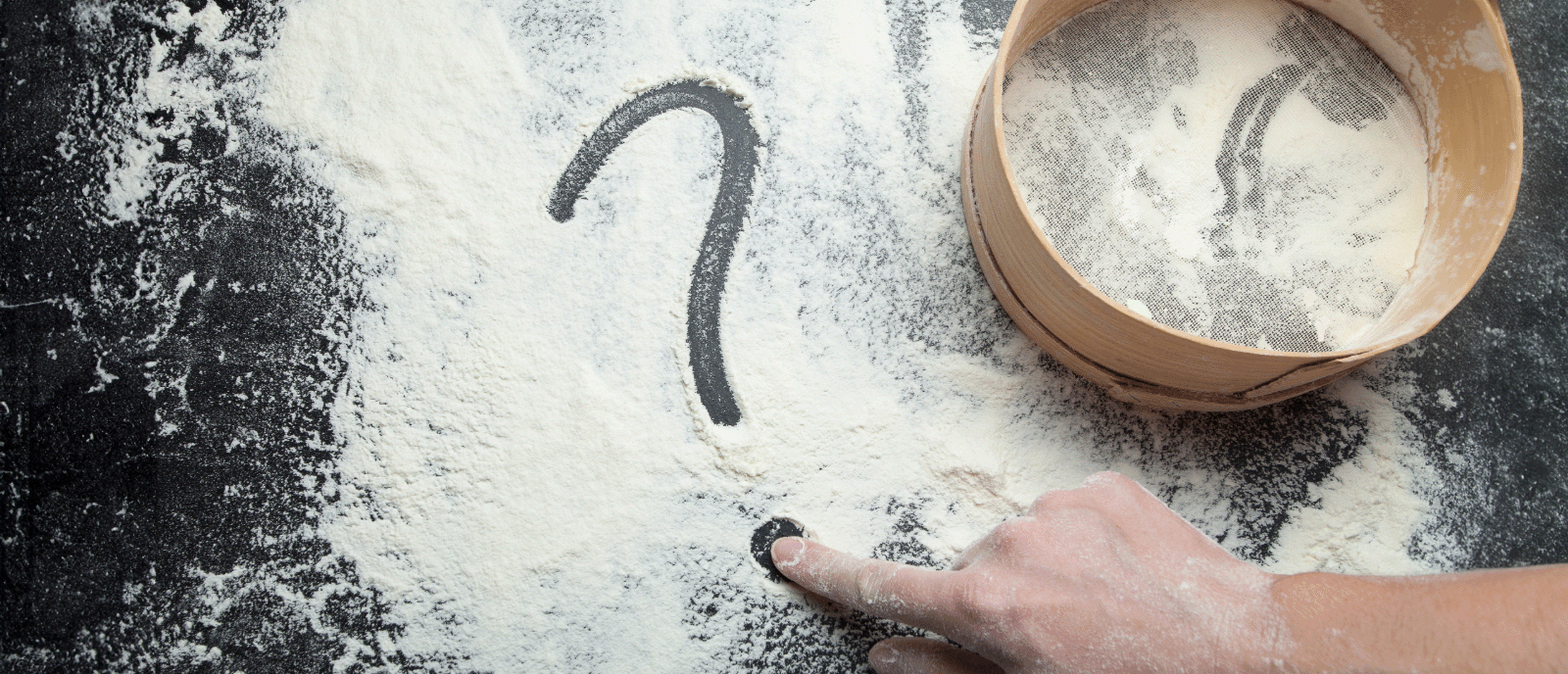 Question mark drawn in flour