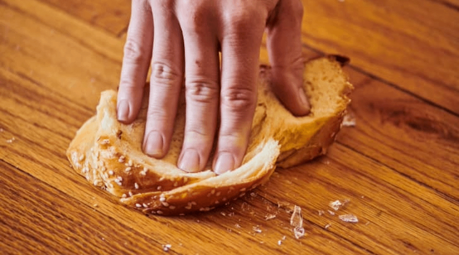 Using a slice of bread to pick up glass