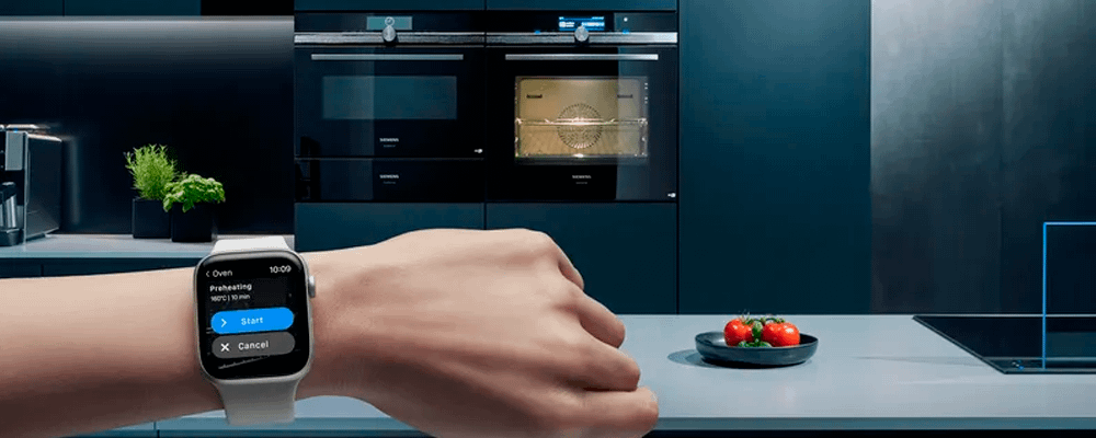 Person using their smart watch to control their Siemens oven