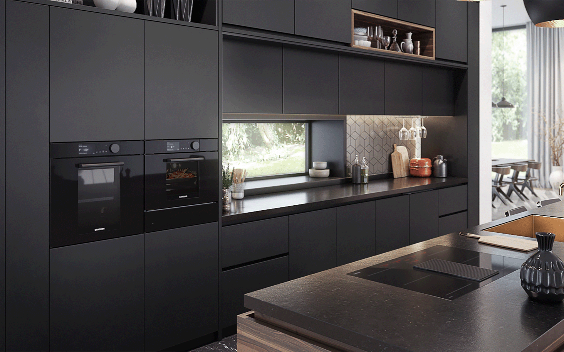 2 built in ovens in a black modern kitchen