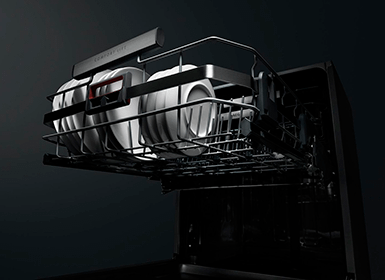 Moody image of an AEG dishwasher with their shelves out using comfort lift. On a black background