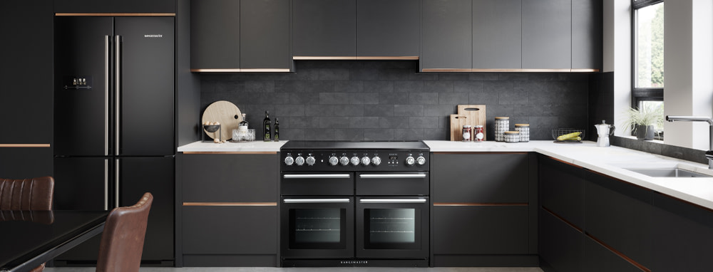 Charcoal black Rangemaster range cooker in a grey kitchen