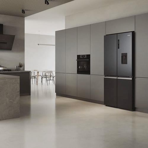 Black American style fridge freezer in grey housing