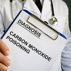 Clipboard with text "Diagnosis: Carbon Monoxide Poisoning"