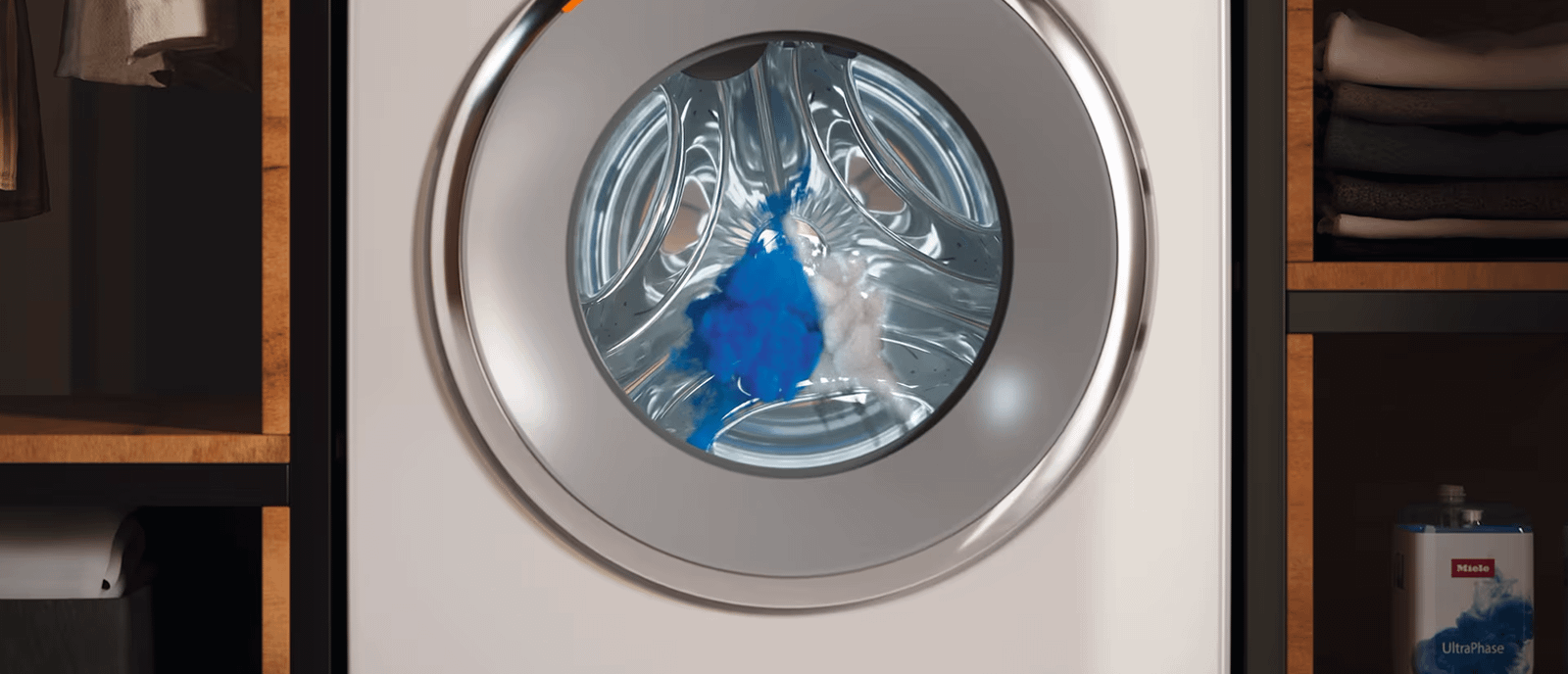 Miele auto dosing washing machine showing distributing of detergent