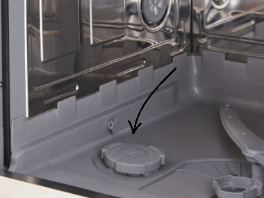 Arrow pointing to the dishwasher float found at the bottom of a dishwasher