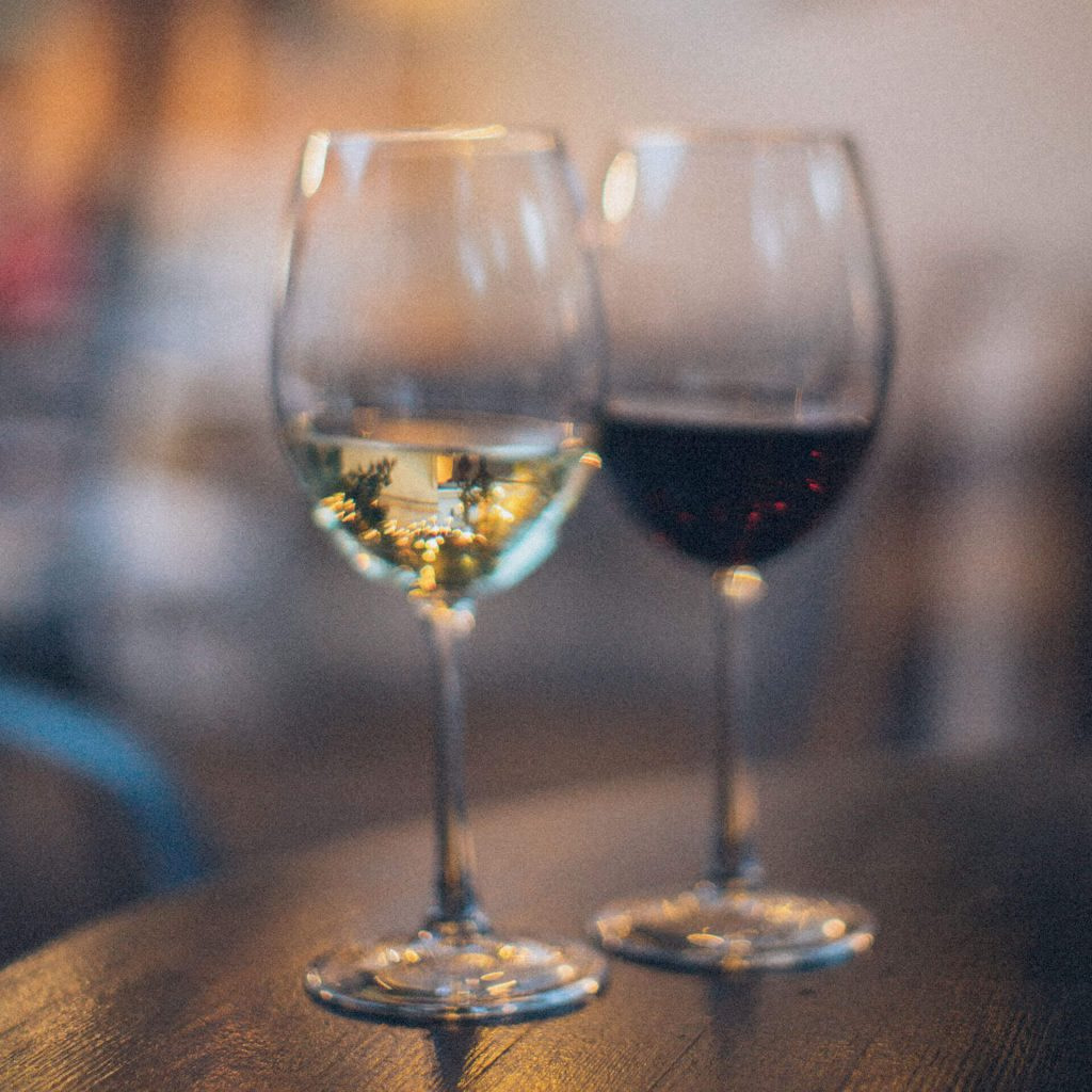 Glasses of white and red wine