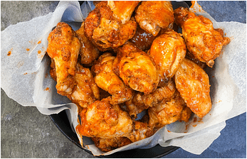 Buffalo wings for an ideal starter for American diner themed dinner party