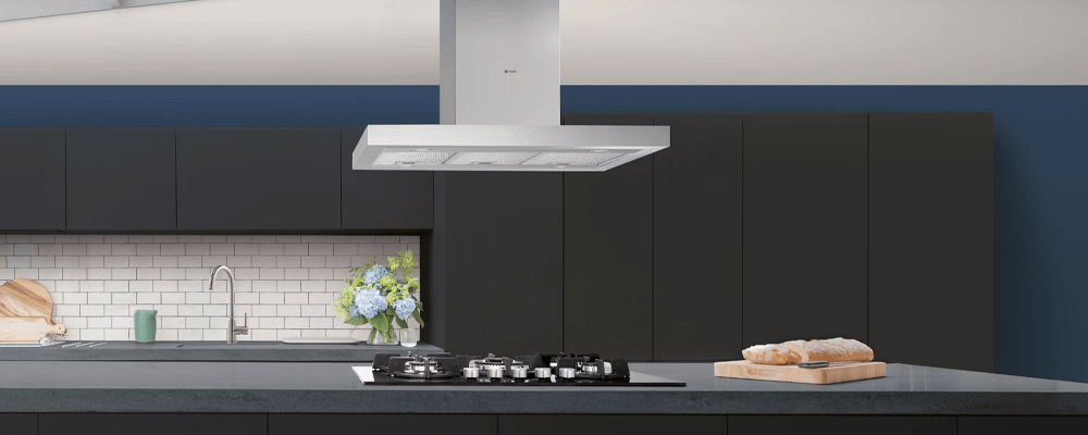 Caple chimney hood in a black and blue kitchen
