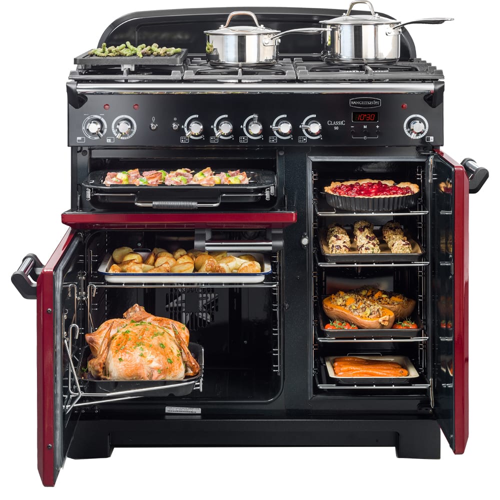 CDL100DFFCY B.rangemaster1 Rangemaster range cooker in red, opened up and showing different cavities