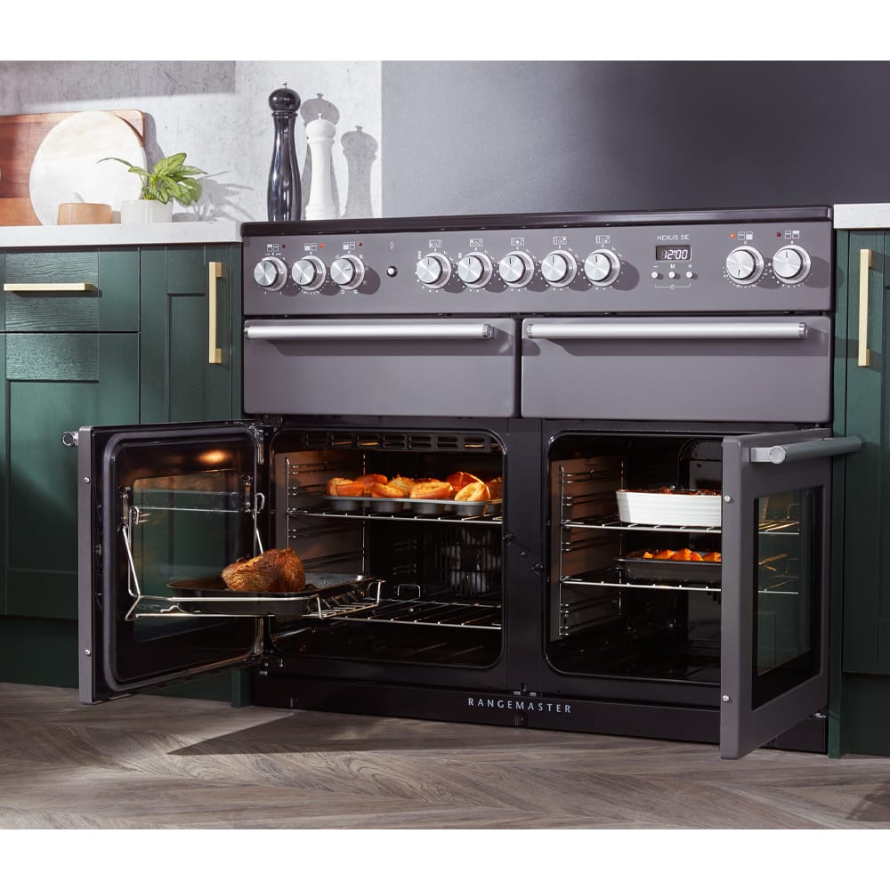 NEXSE110DFSS C.rangemaster Rangemaster range cooker in stainless steal with cavity doors open