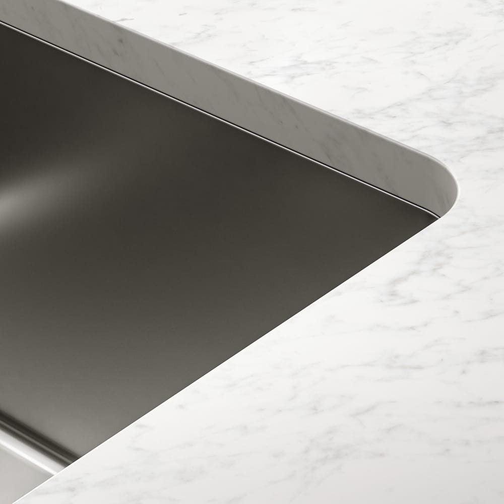 franke-myx-undermount-close-up-2-1000x1000 A Franke Mythos undermount sink finished in stainless steel. This image is a close up of the bowl to show the undermount fitting.