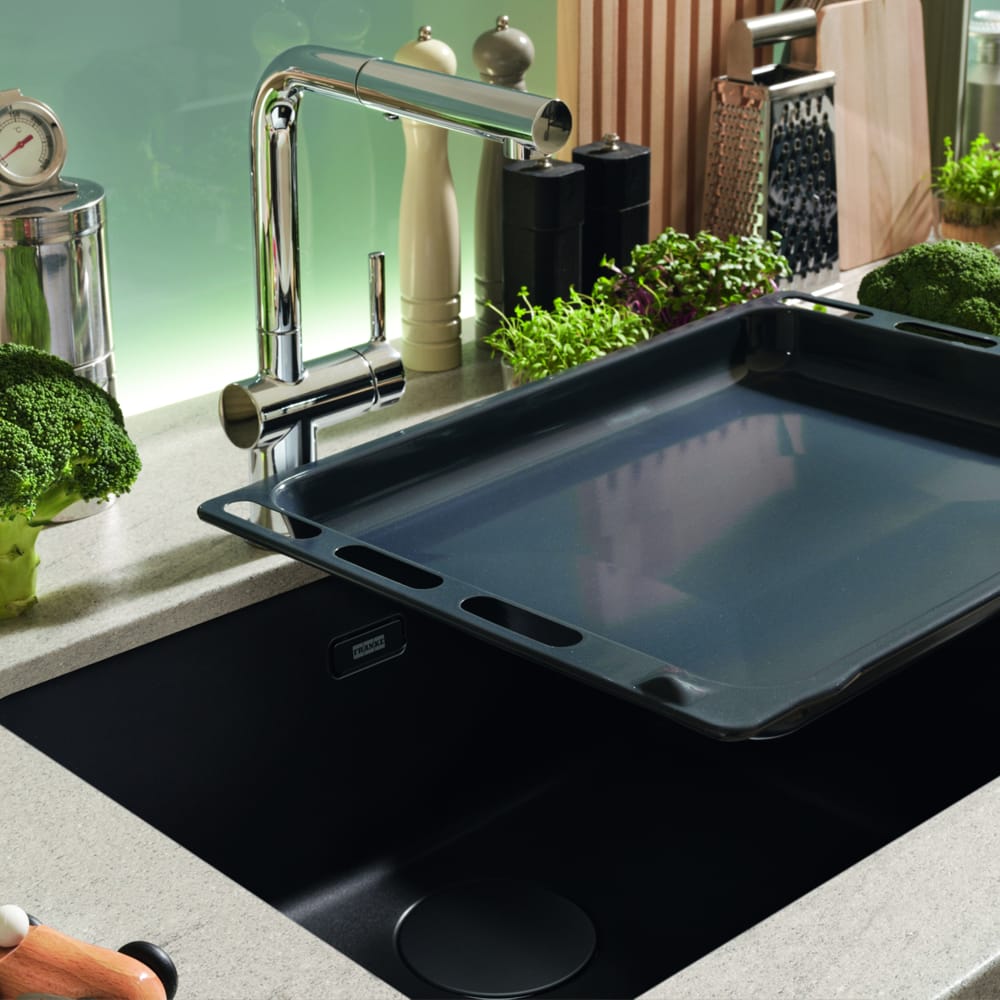 franke-maris-undermount-1000x1000 Franke Maris undermount sink in matt black in a green kitchen surrounded by broccoli and a black oven tray.