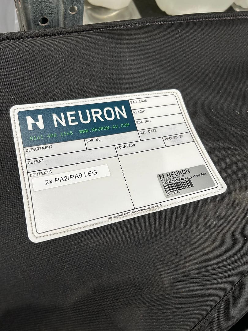 Le Mark Flexi PAL labels sewn onto soft bags for durable equipment identification