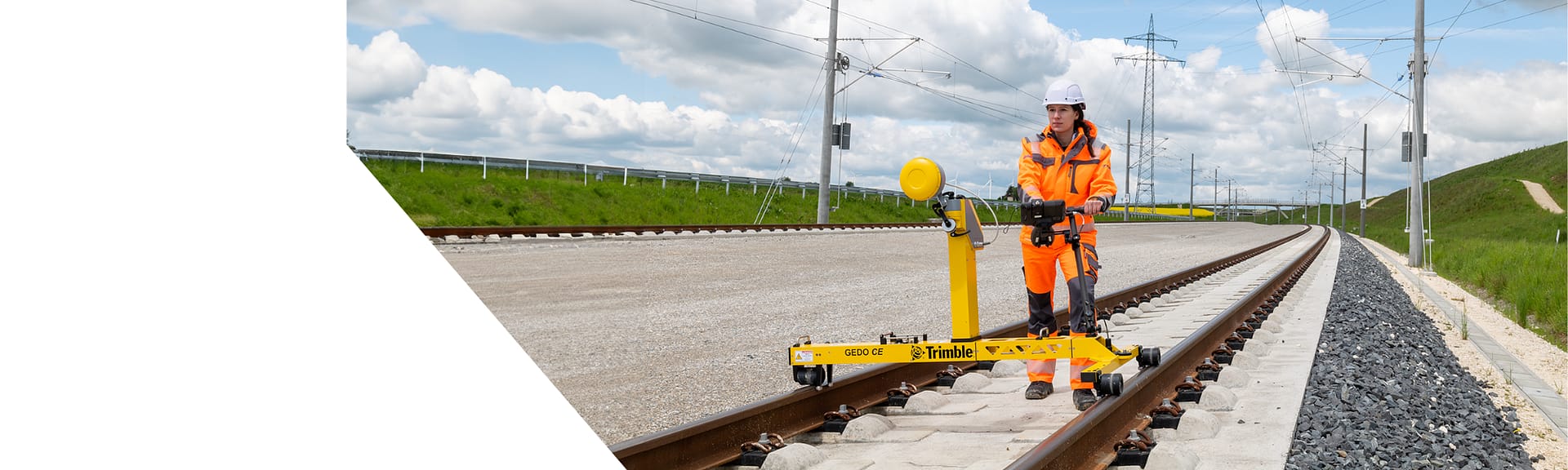 Rail surveyor using the Trimble GEDO CE track measurement trolley and GX50 kinematic laser scanner