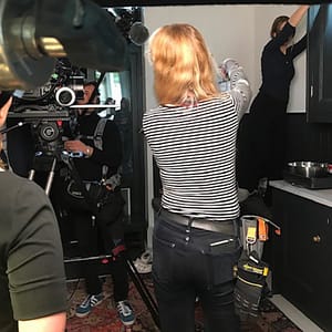 Camera assistant Bianka on set with a gaffer tape attachment and Dirty Rigger comfort fit gloves