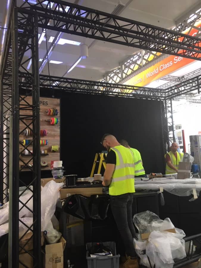 Setting up the Le Mark stand at PLASA