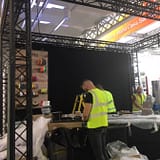 Setting up the Le Mark stand at PLASA