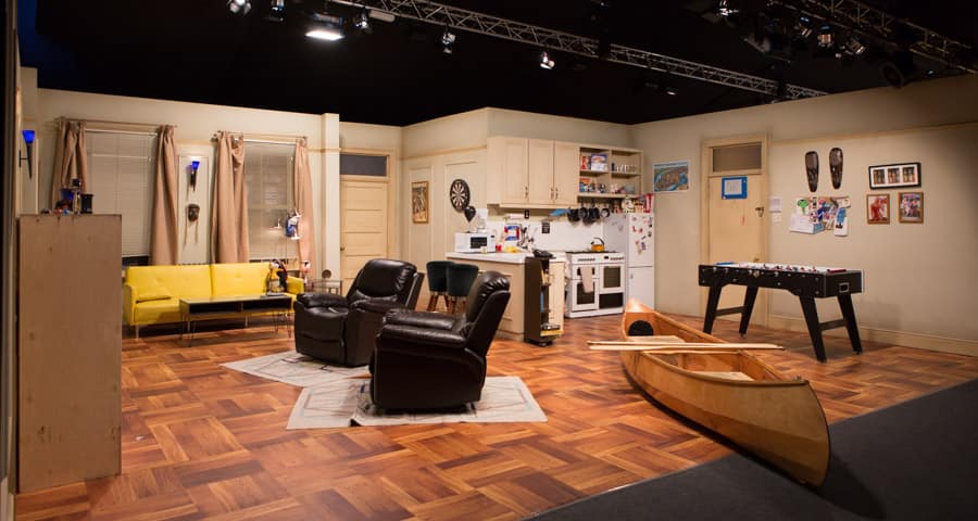 Joey & Chandler's apartment set at Friends Fest with the custom printed floor produced by Le Mark