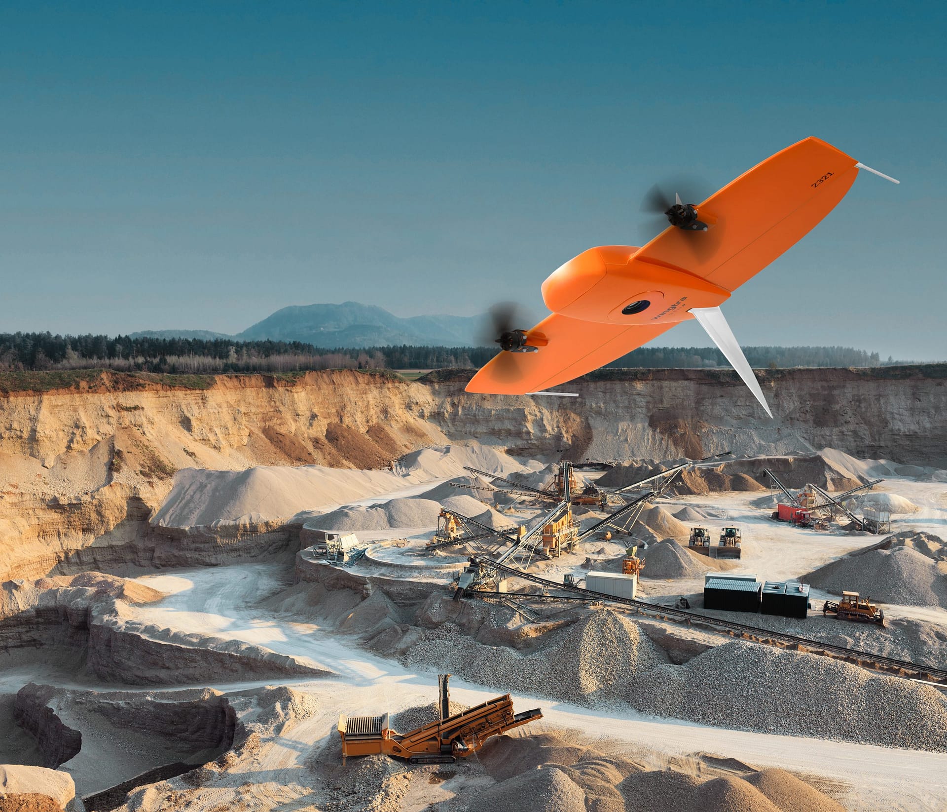 https://mlvtgiqzoszz.i.optimole.com/w:auto/h:auto/q:mauto/f:best/https://korec.uk/wp-content/uploads/2023/12/2021-wingtra-drone-over-quarry2-scaled.jpg