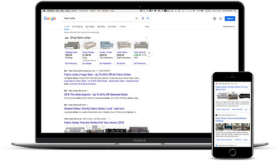 A laptop and mobile phone displaying search results