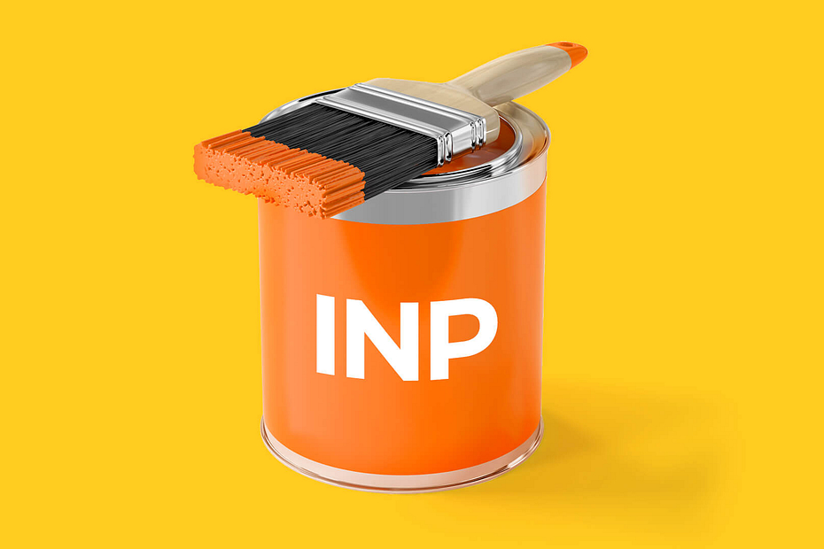 An orange pot of paint against a yellow background
