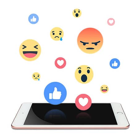 Reaction emojis from social media on a mobile phone